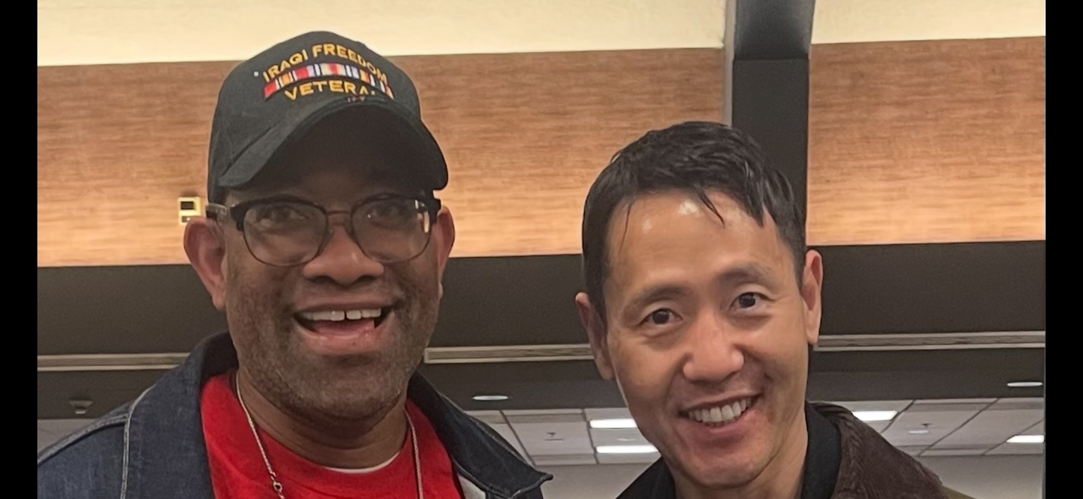 DJ Holland with an entertainment-industry colleague