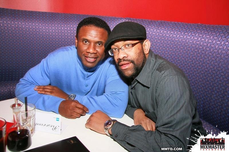 DJ Holland and Dennis McKinnon seated together at Blu Coral