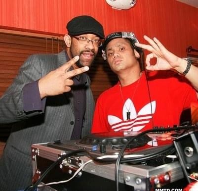 DJ Holland and DJ Flipside behind the turntables at Blu Coral
