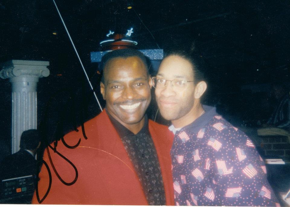 DJ Holland with his former boss and mentor Walter Payton