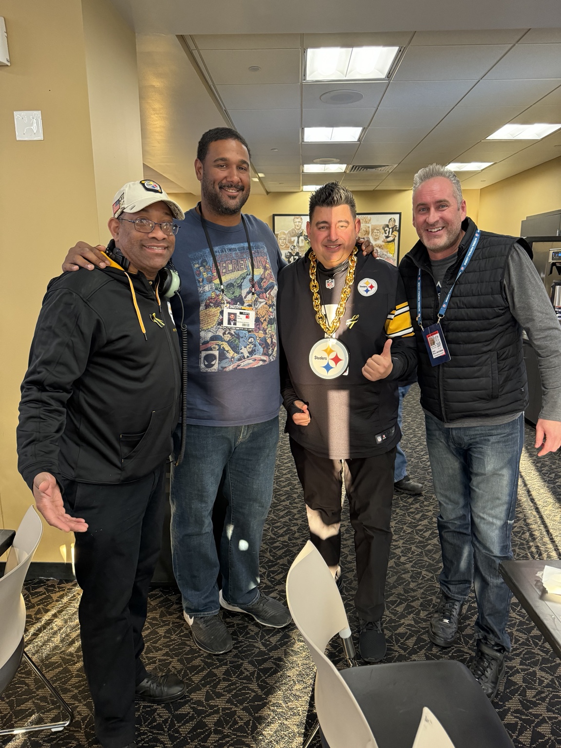 DJ Holland with Max Starks and members of the Pittsburgh Steelers game-day production team